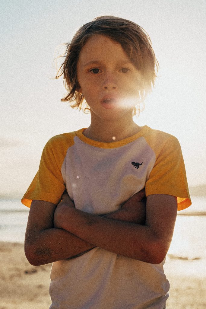 boy at the beach for kids photoshoot